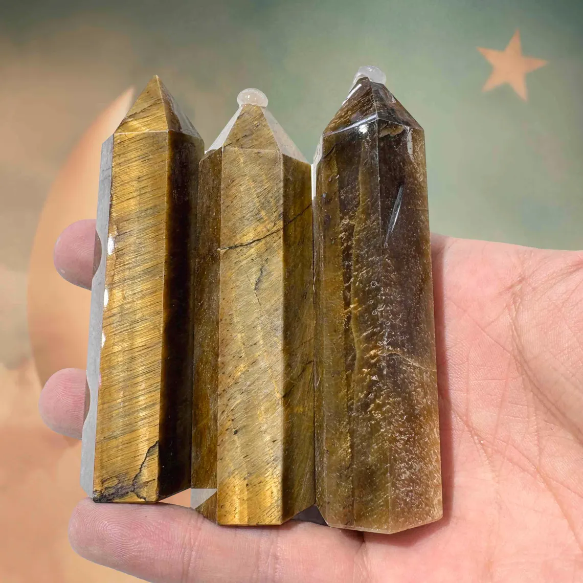 Natural tiger's eye crystal tower 6–8cm with golden-brown chatoyancy