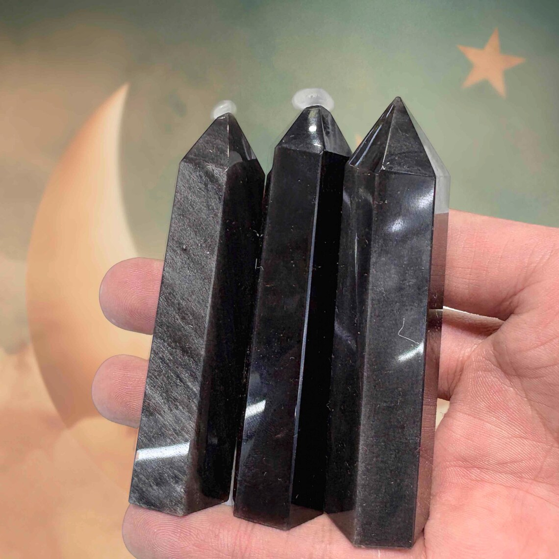 Natural silver sheen obsidian tower 6–9cm with shimmering reflection