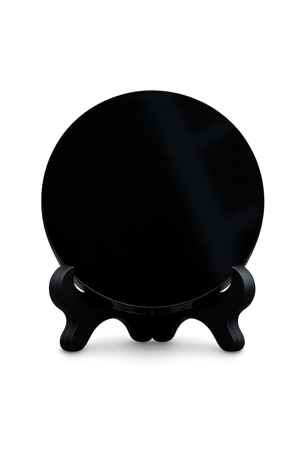 Hand-polished black obsidian mirror with glass-smooth reflective surface