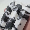 Video of zebra jasper tower rotating to show contrasting bands