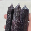 Video of lepidolite tower rotating to show natural color variation